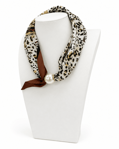 Scarf-style necklace mixing pearls and leopard print
