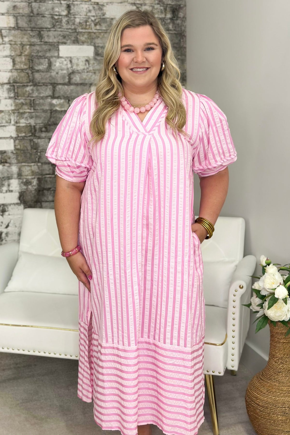 Striped midi dress with a relaxed drape and open collar