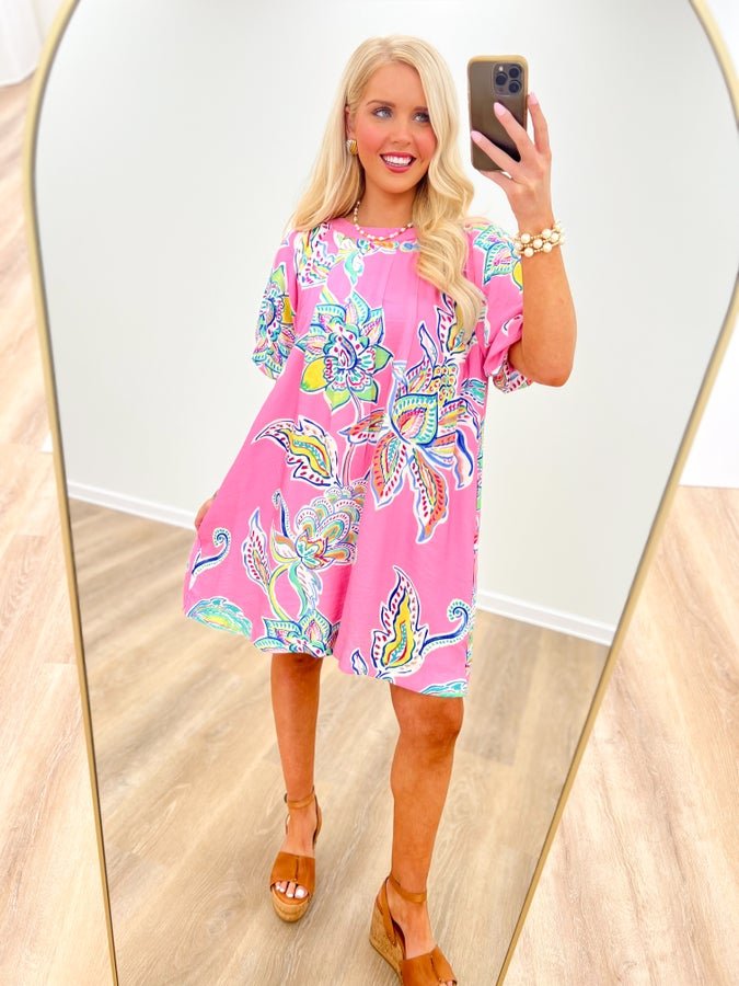 Printed dress with soft bubble sleeves and a fluid drape