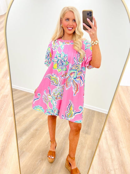 Printed dress with soft bubble sleeves and a fluid drape