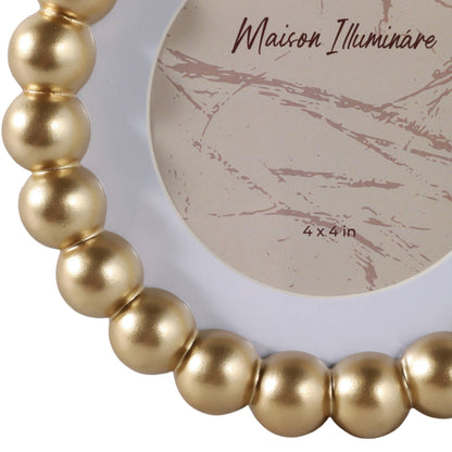 Elegant beaded gold frame with a matted 6x6 opening