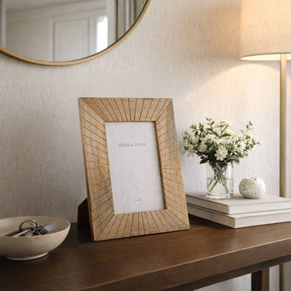 Starburst-patterned wooden photo frame in a natural finish, 4x6