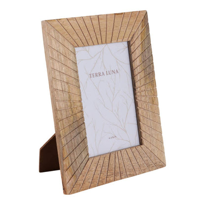 Natural-finish wooden frame with a radiating starburst design