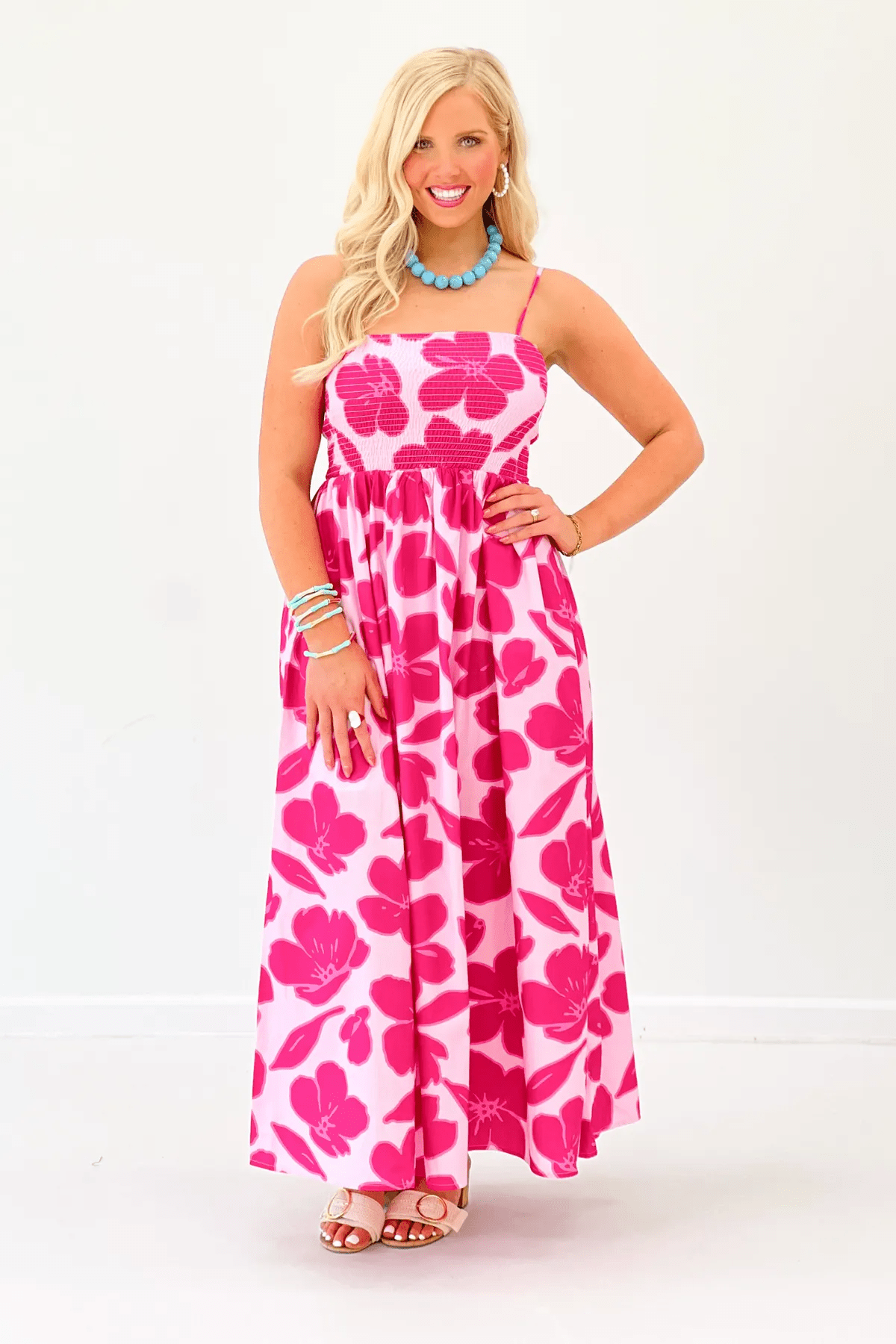 Two-tone pink midi dress with a smocked, zipperless bodice