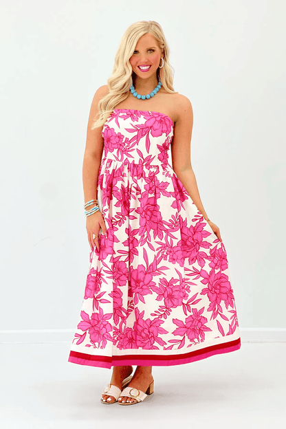 Pink floral strapless midi dress with a structured bodice
