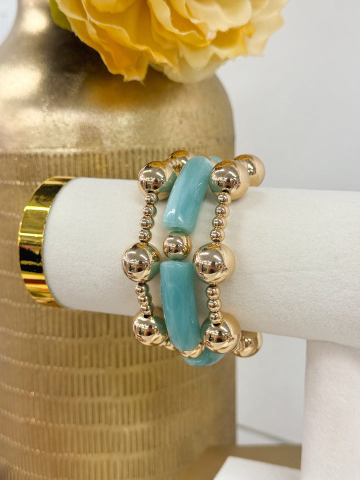 Bracelet mixing tube beads and metallic balls