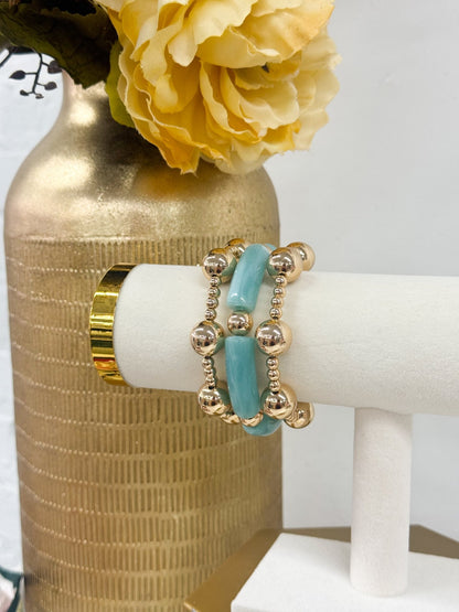 Beaded bracelet with pipe-shaped and round beads