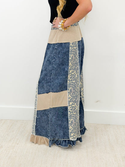 Indigo pants with contrast animal print patch panels