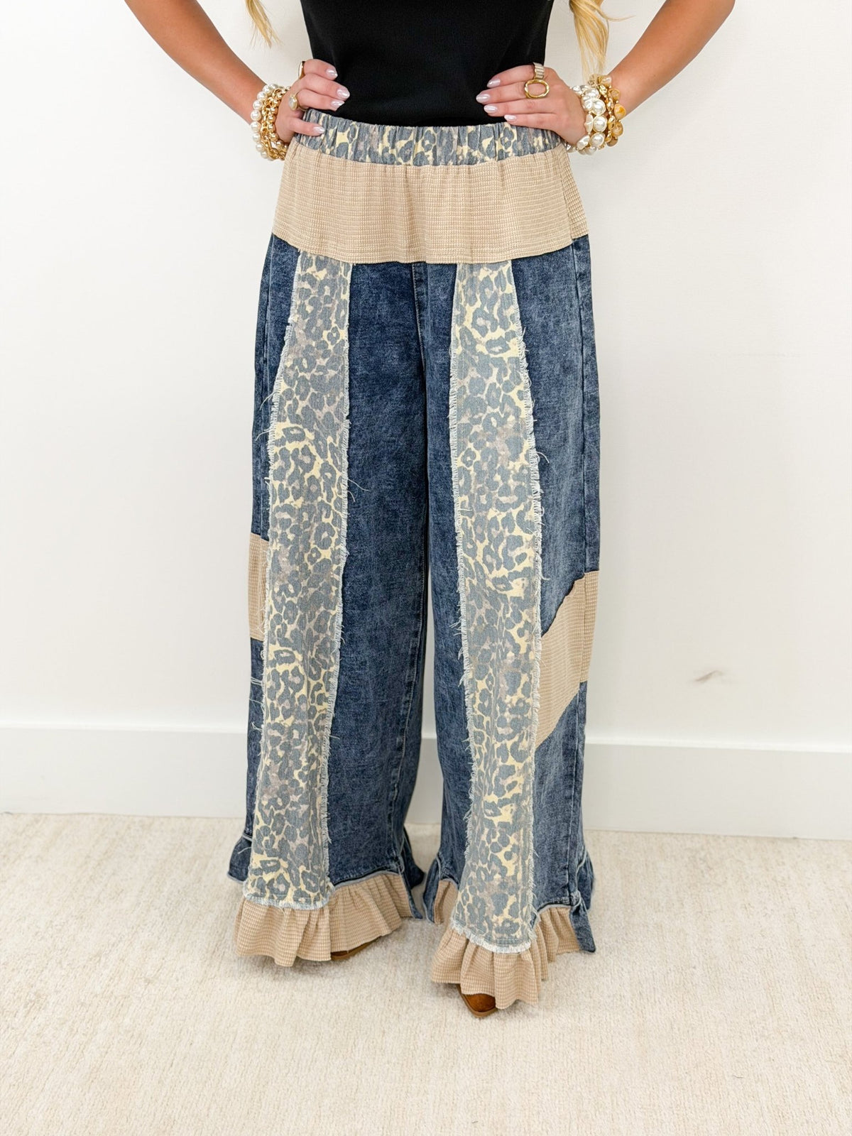 Patchwork animal print pants in a deep indigo wash