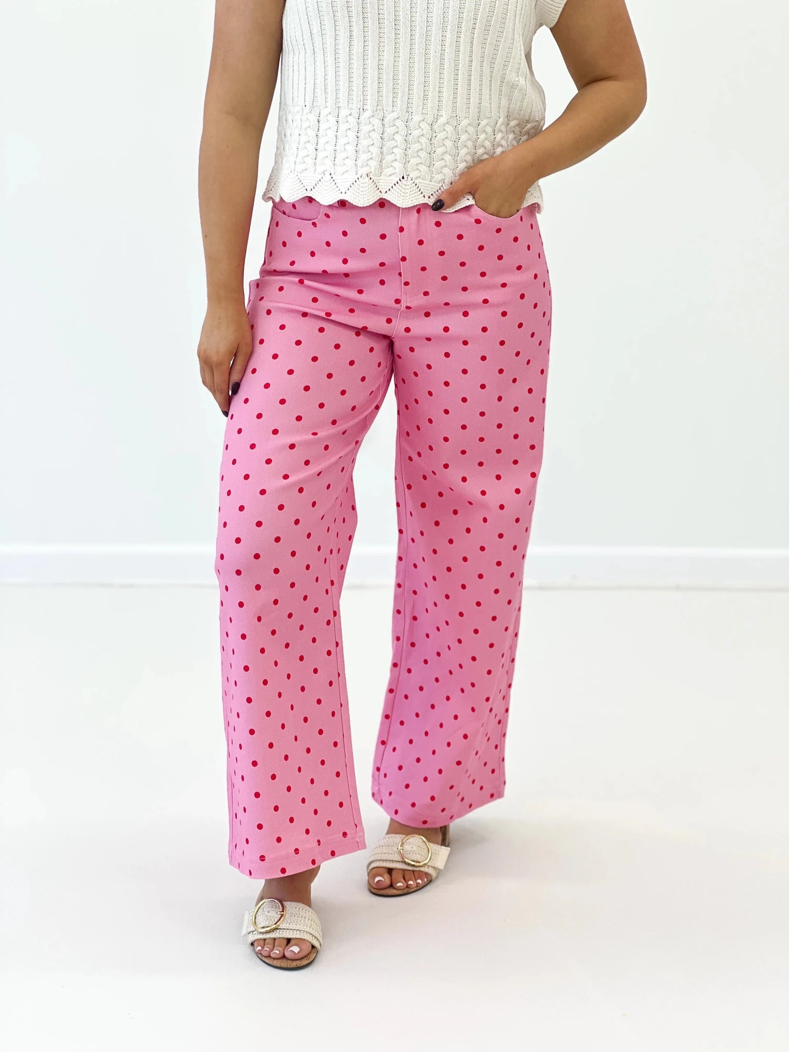 Dot print pants with a relaxed high waist