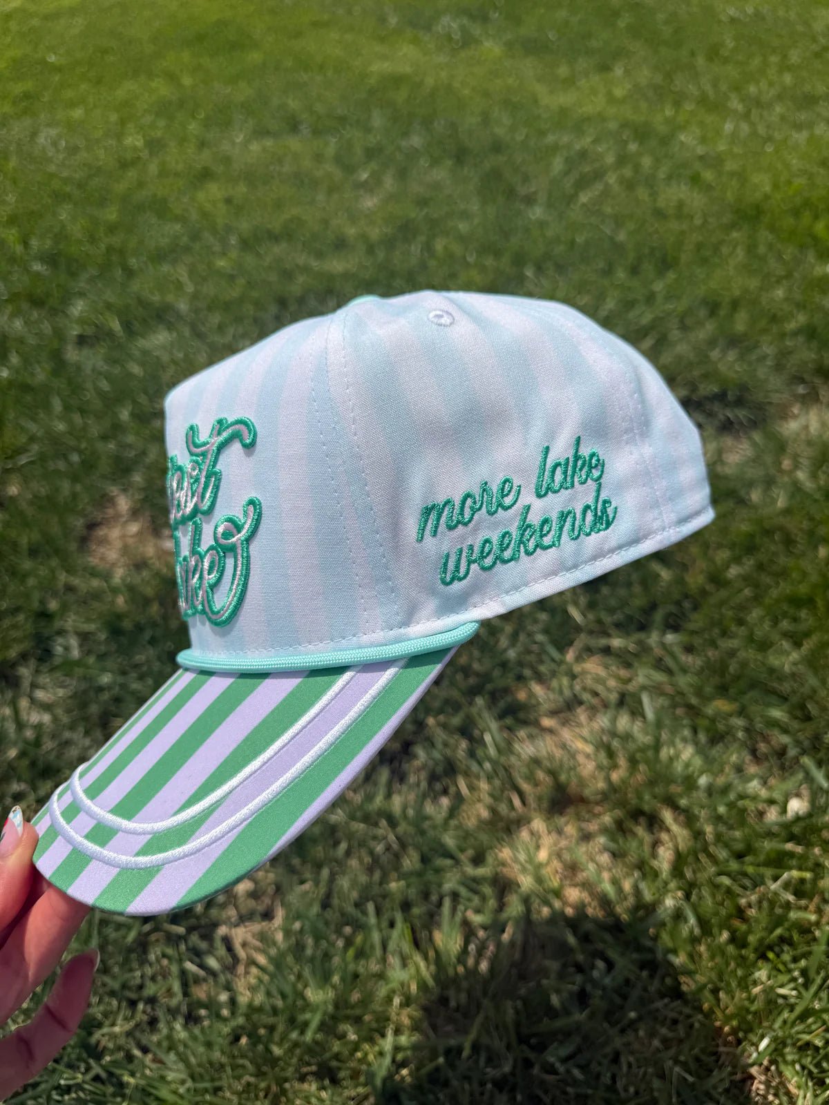 Multicolour cap featuring Happiest at the Lake wording