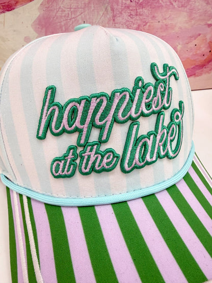 Lake-themed multicolour cap with Happiest at the Lake text on the front