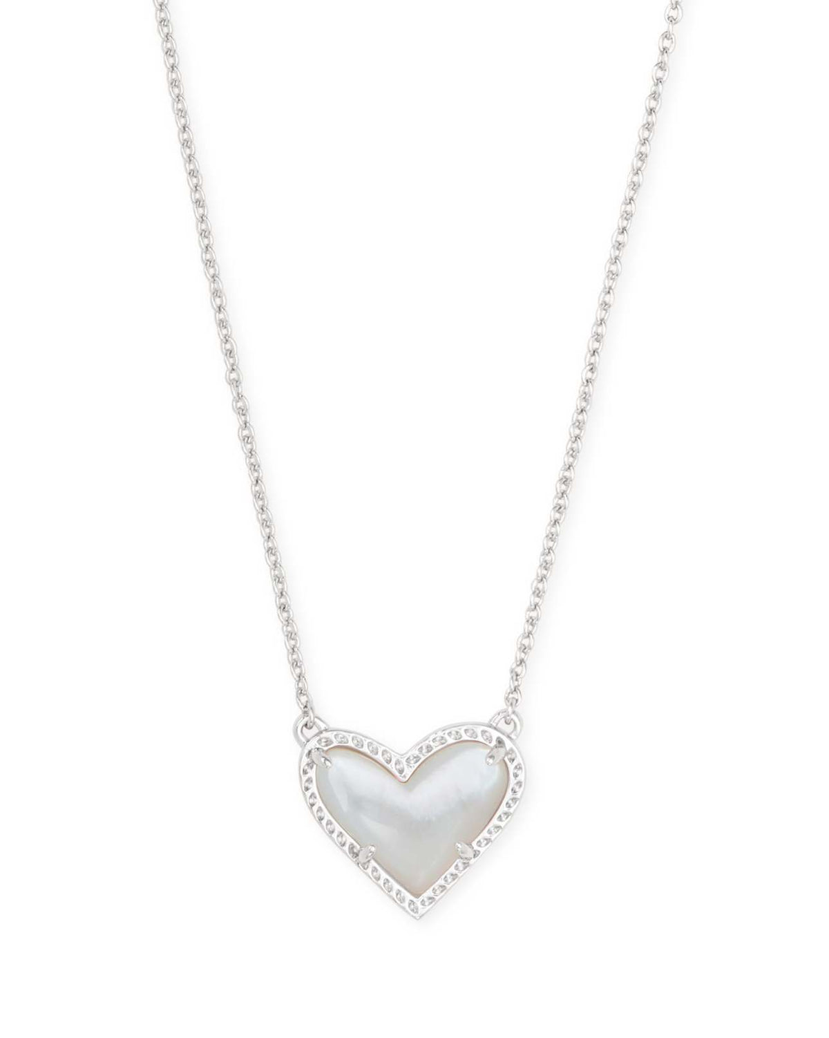 Rhodium heart pendant necklace with ivory mother-of-pearl center and clear accents