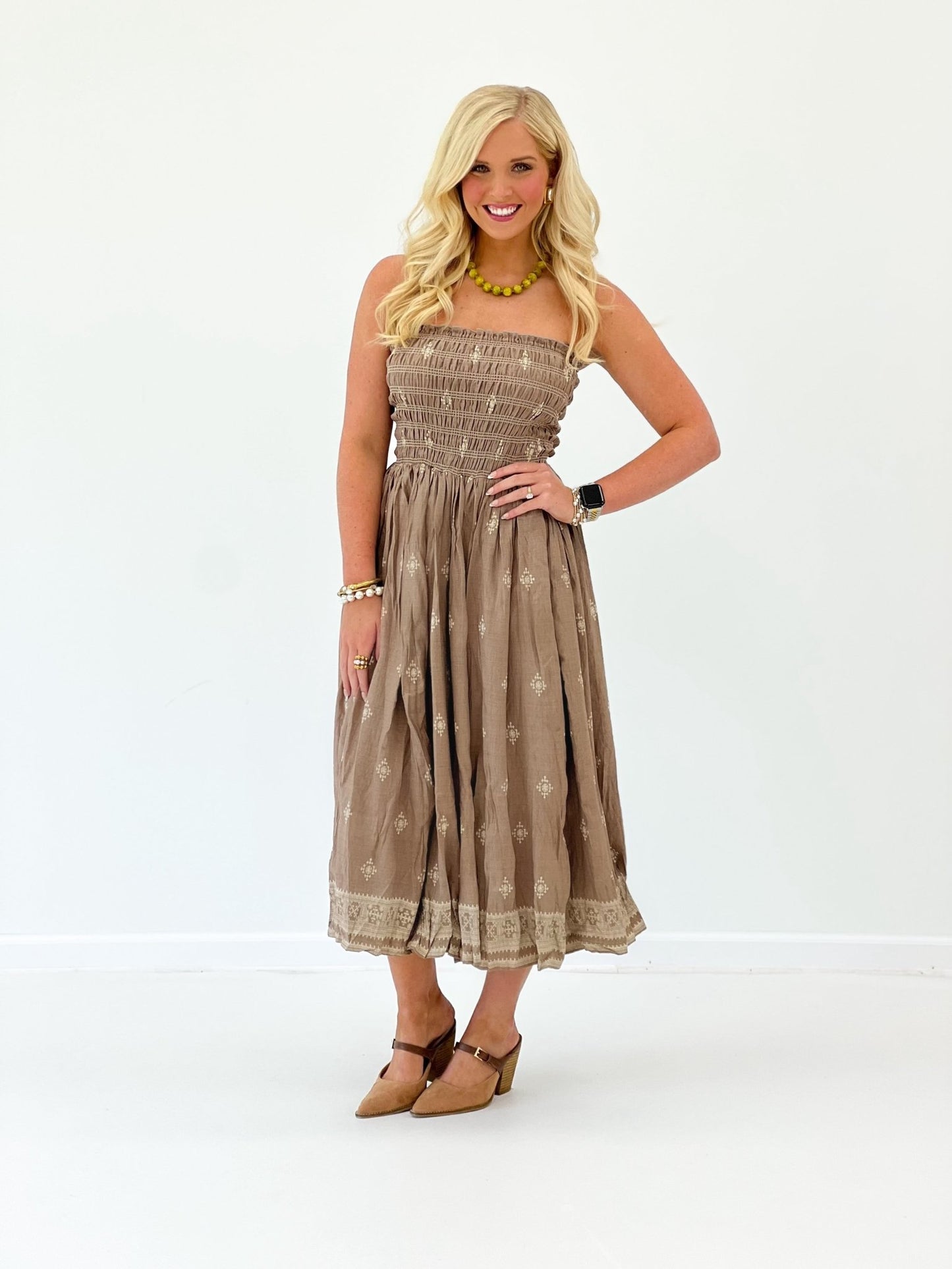Mocha strapless midi dress with smocked texture and lace border at the hem