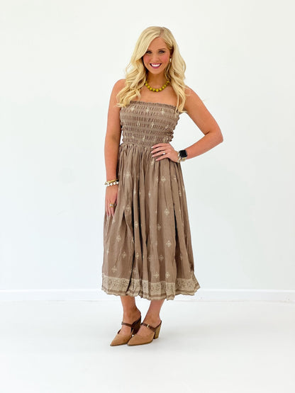 Mocha strapless midi dress with smocked texture and lace border at the hem