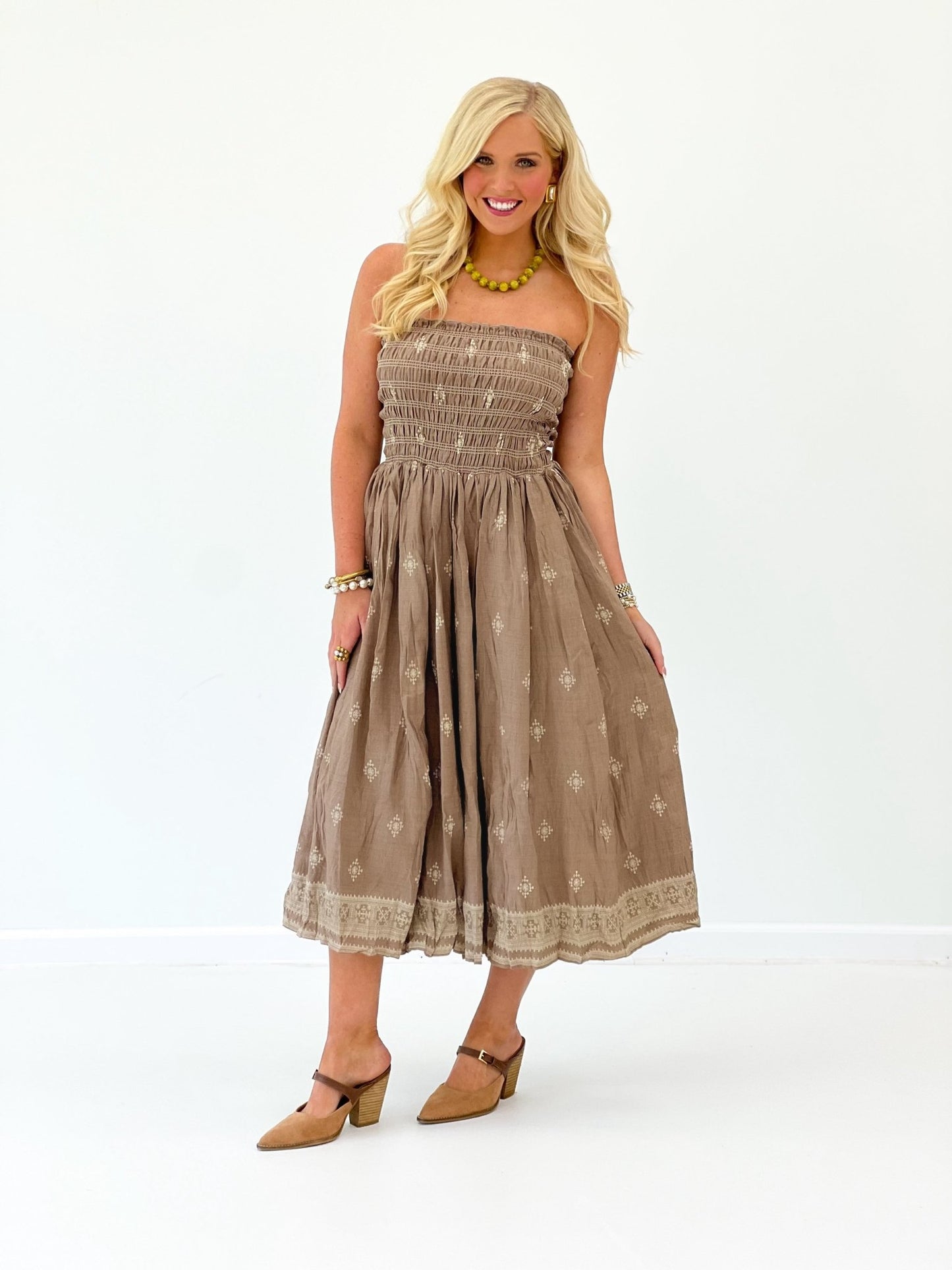 Mocha strapless smocked midi dress with gathered skirt and delicate lace trim