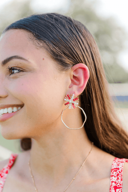 Red and white sequin sunburst hoop earrings