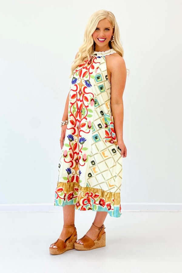 Floor length printed dress in a red mix palette