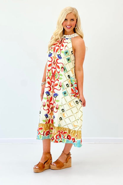 Floor length printed dress in a red mix palette