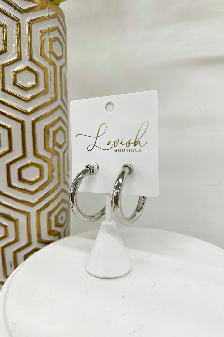 Rhodium hoops with crystals along the outer edge