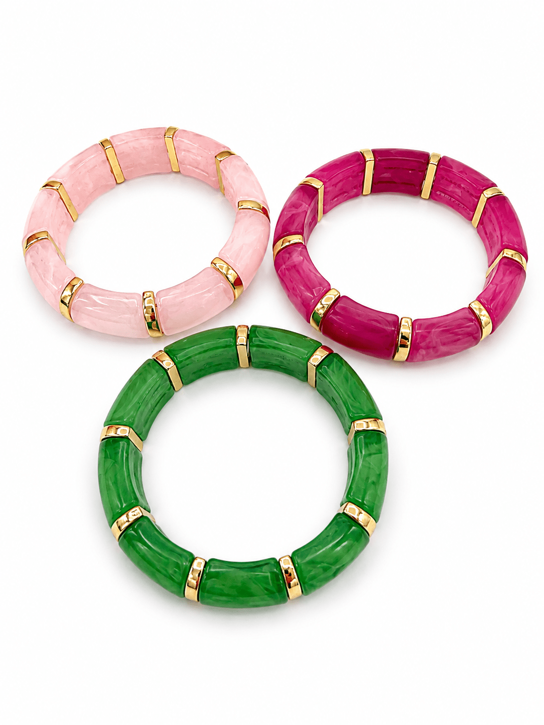 Stretch bracelet combining stones and gold-tone beads