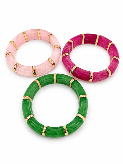 Stretch bracelet combining stones and gold-tone beads