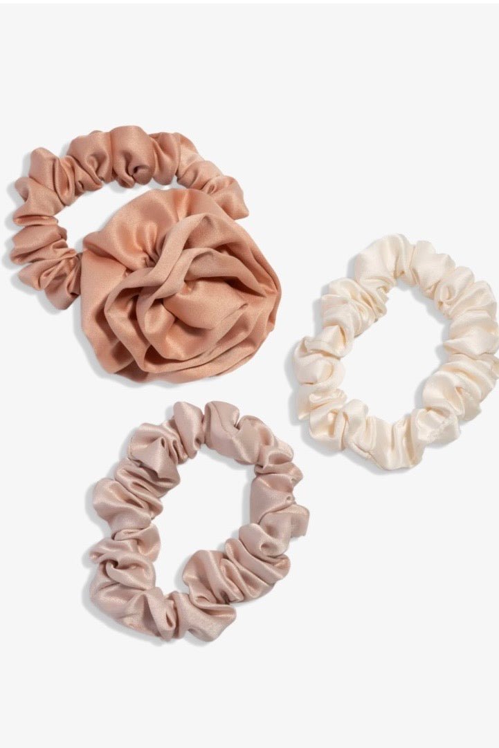 Three ruched satin scrunchies in rosette pink tones