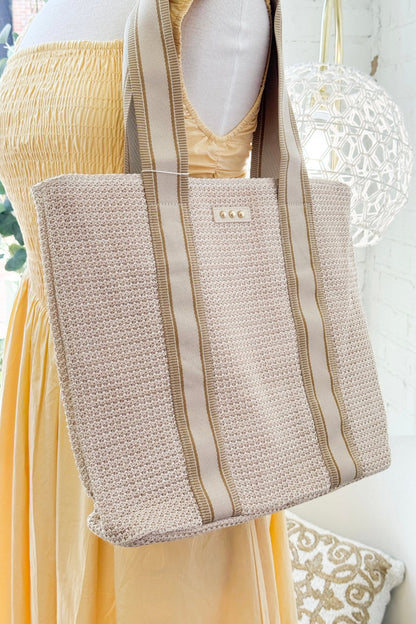 Cream raffia tote bag with a woven texture