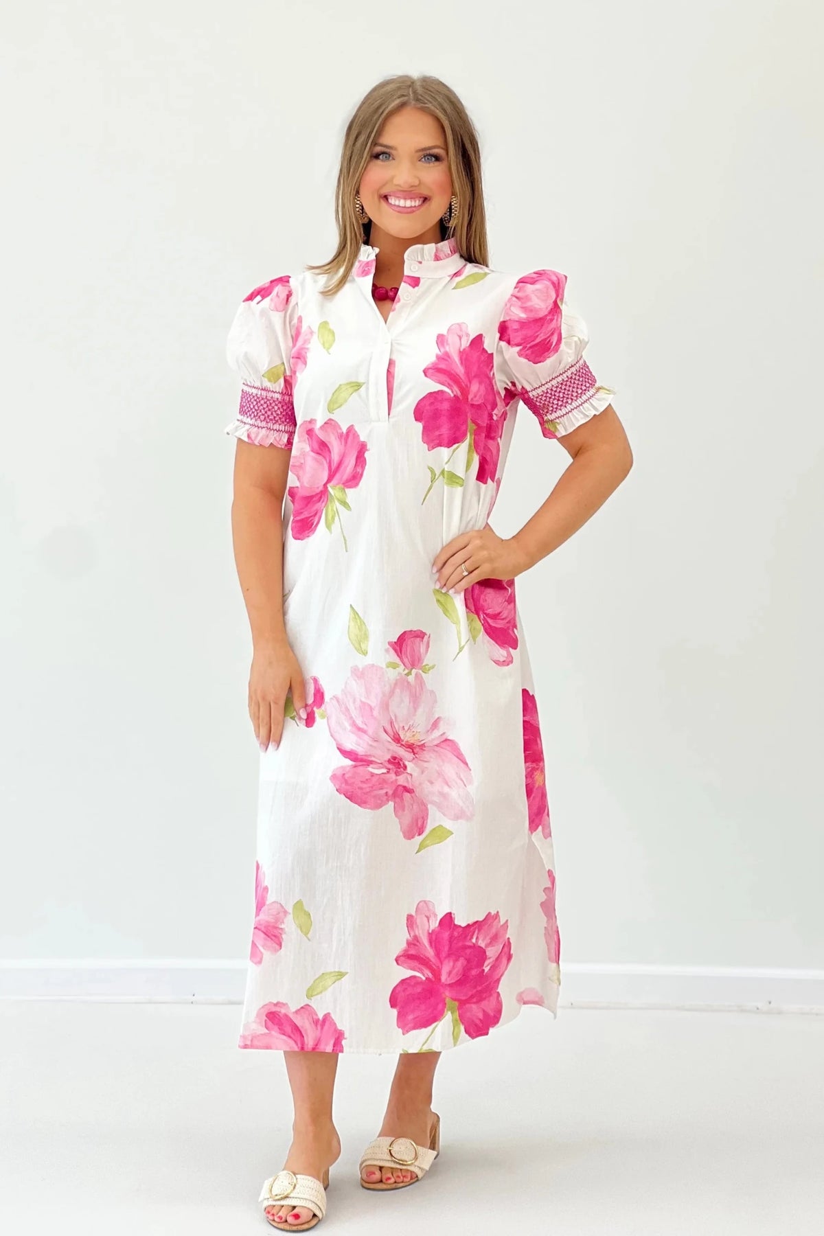 Printed cotton dress with a ruffle neckline and puff sleeves