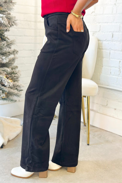 Black suede straight-leg pants, side view with back yoke and front pockets
