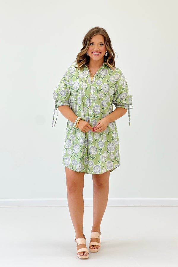 Short sleeve cotton mini dress in a sage botanical print