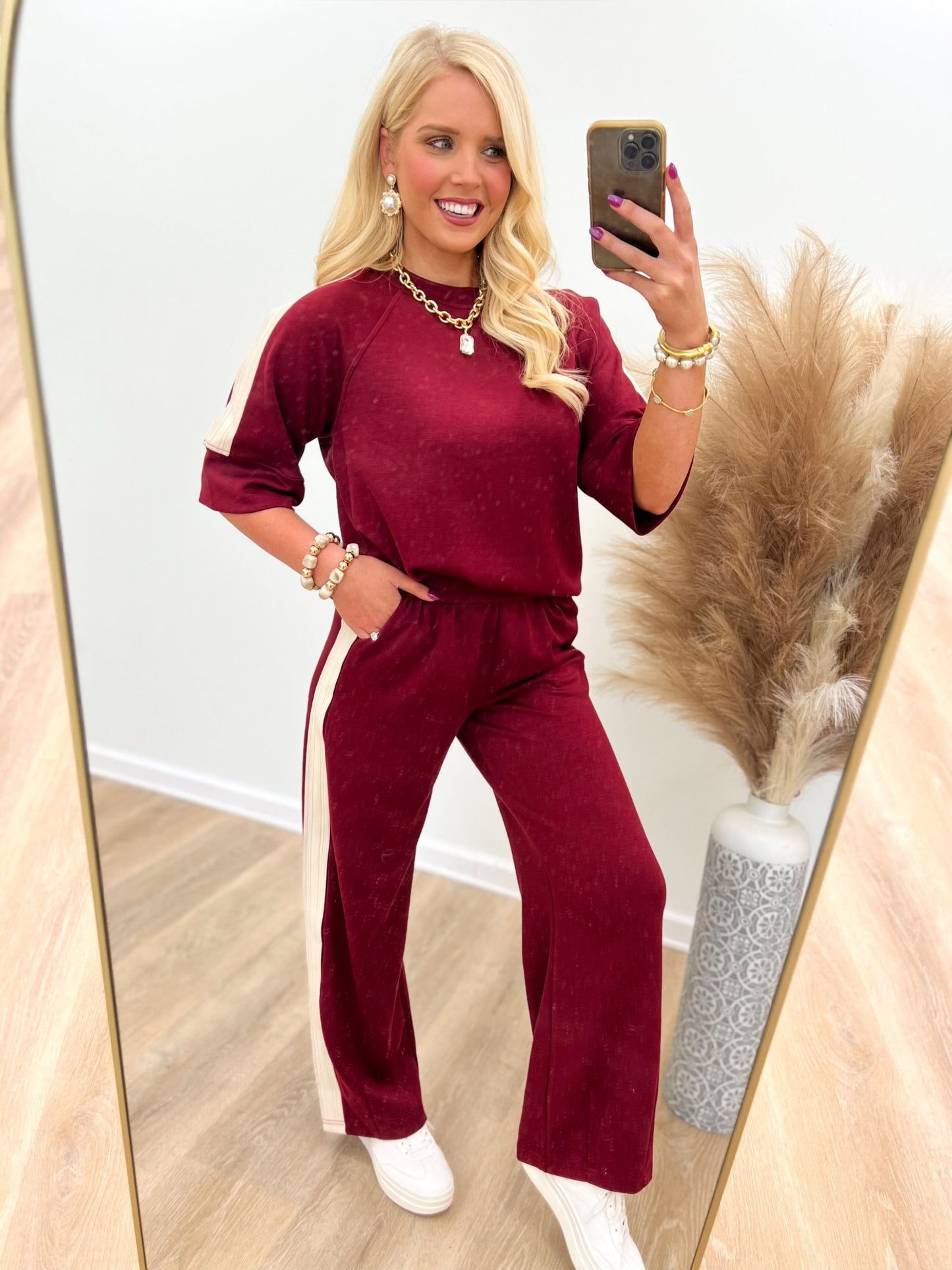 Wine scuba-knit pant set with loose top and wide-leg pants, white side contrast stripes