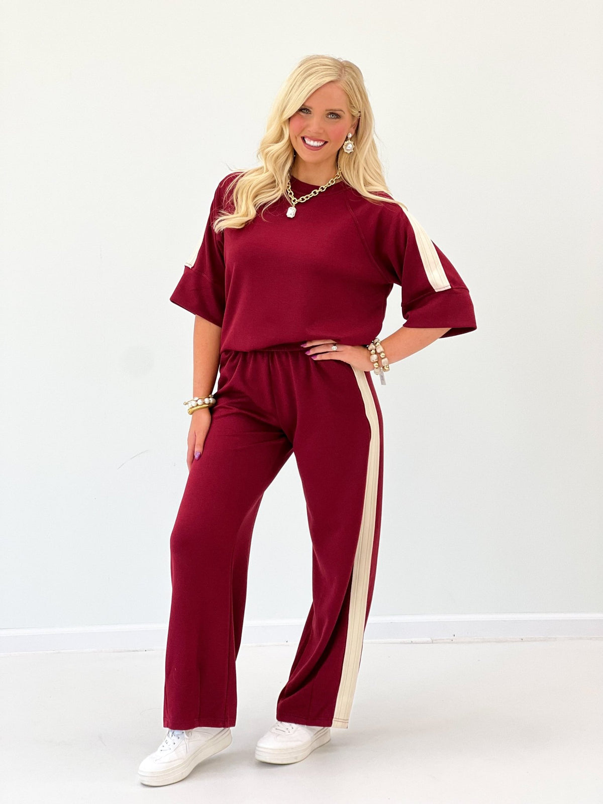 Wine scuba-knit pant set with short-sleeve loose top and wide-leg pants, white side stripes