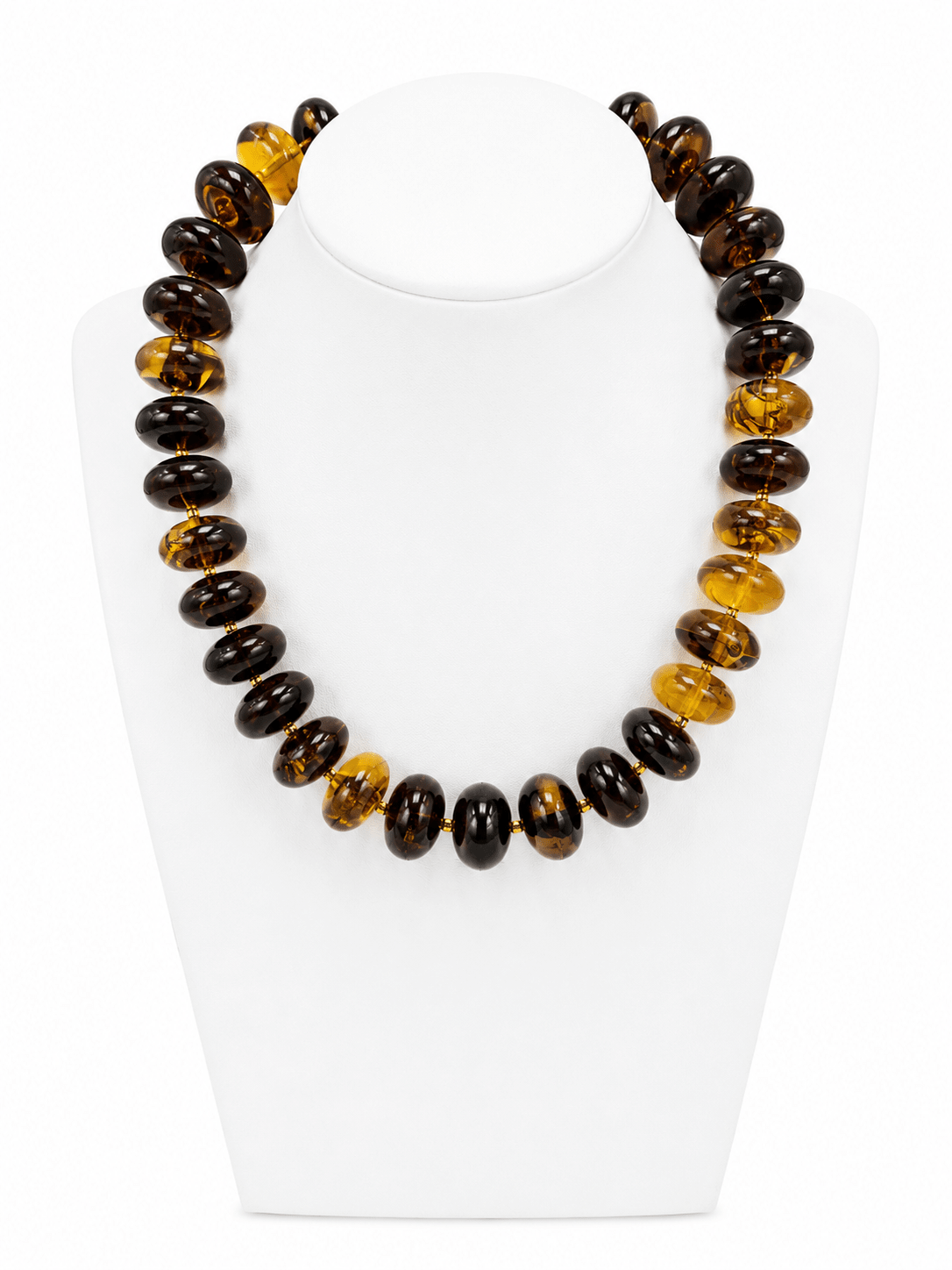 Necklace of veined marbled beads with gold accents