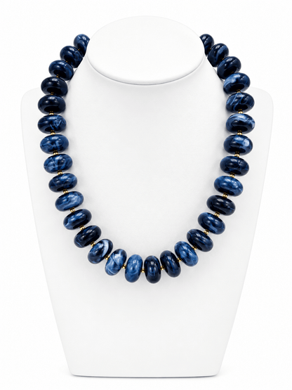 Beaded necklace of marbled resin rounds