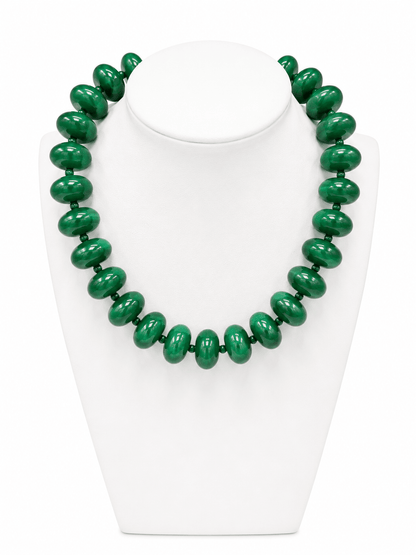 Oversized green beads strung into a short necklace