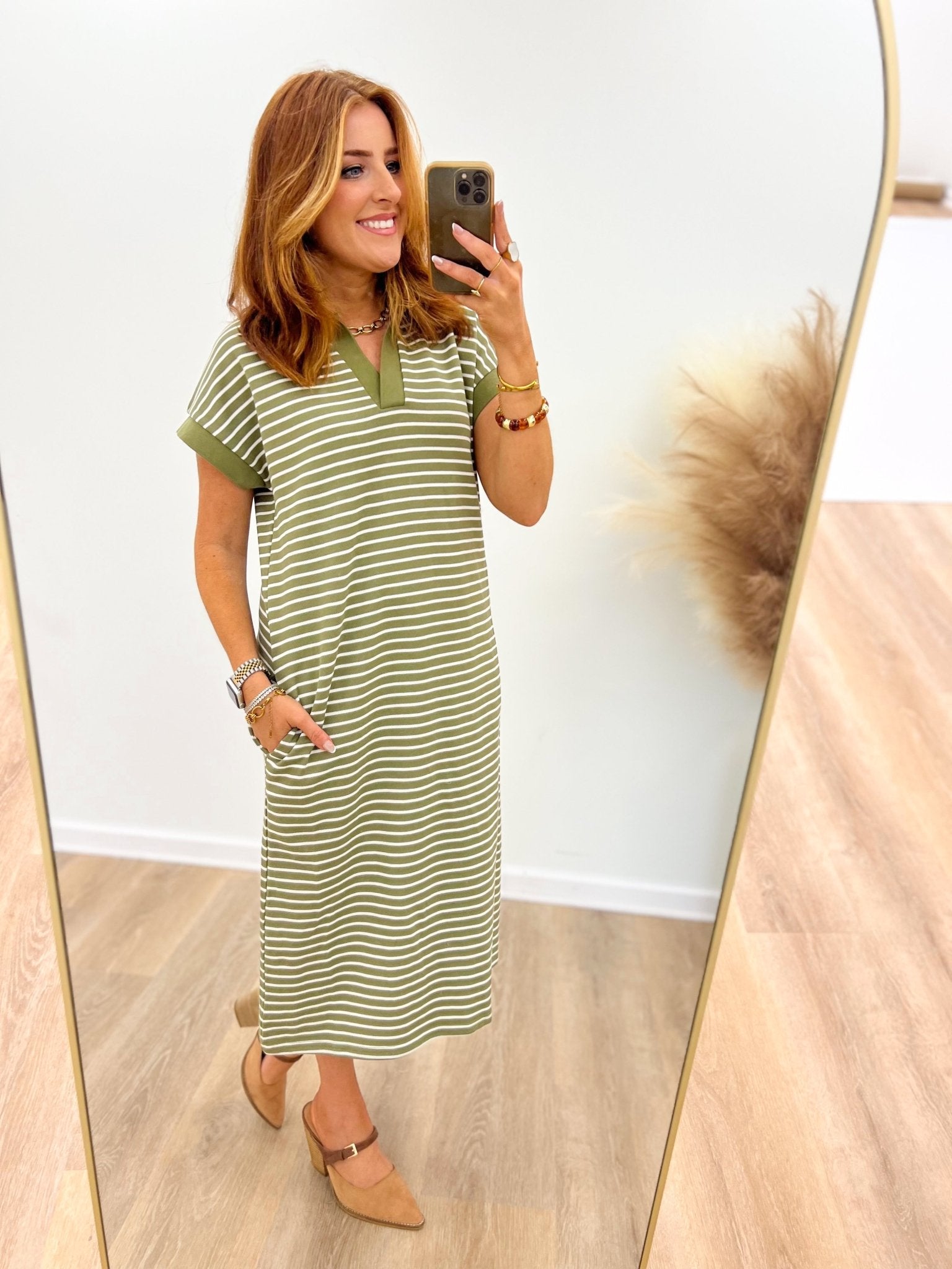 Striped dress falling to a midi length