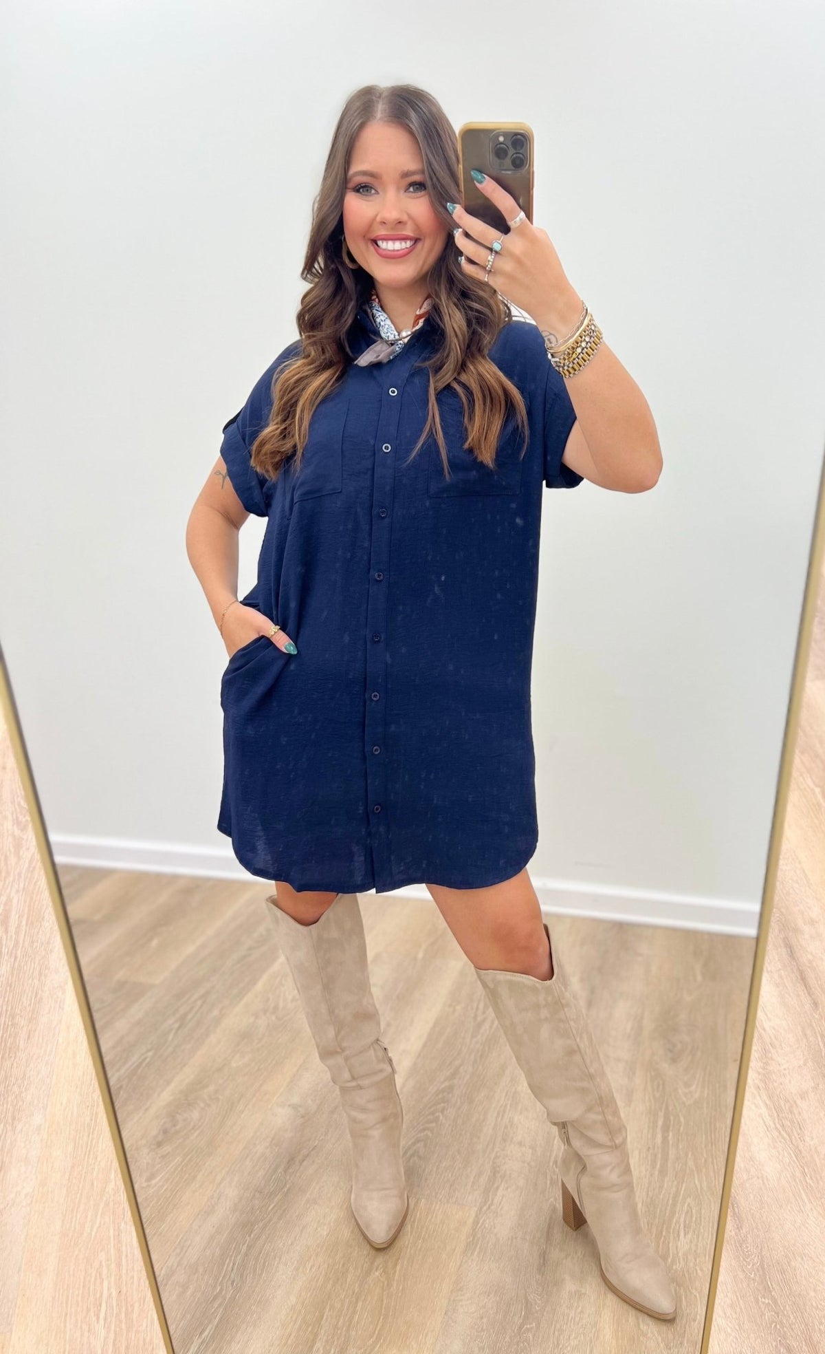 Woven shirt dress with a full button front and side pockets