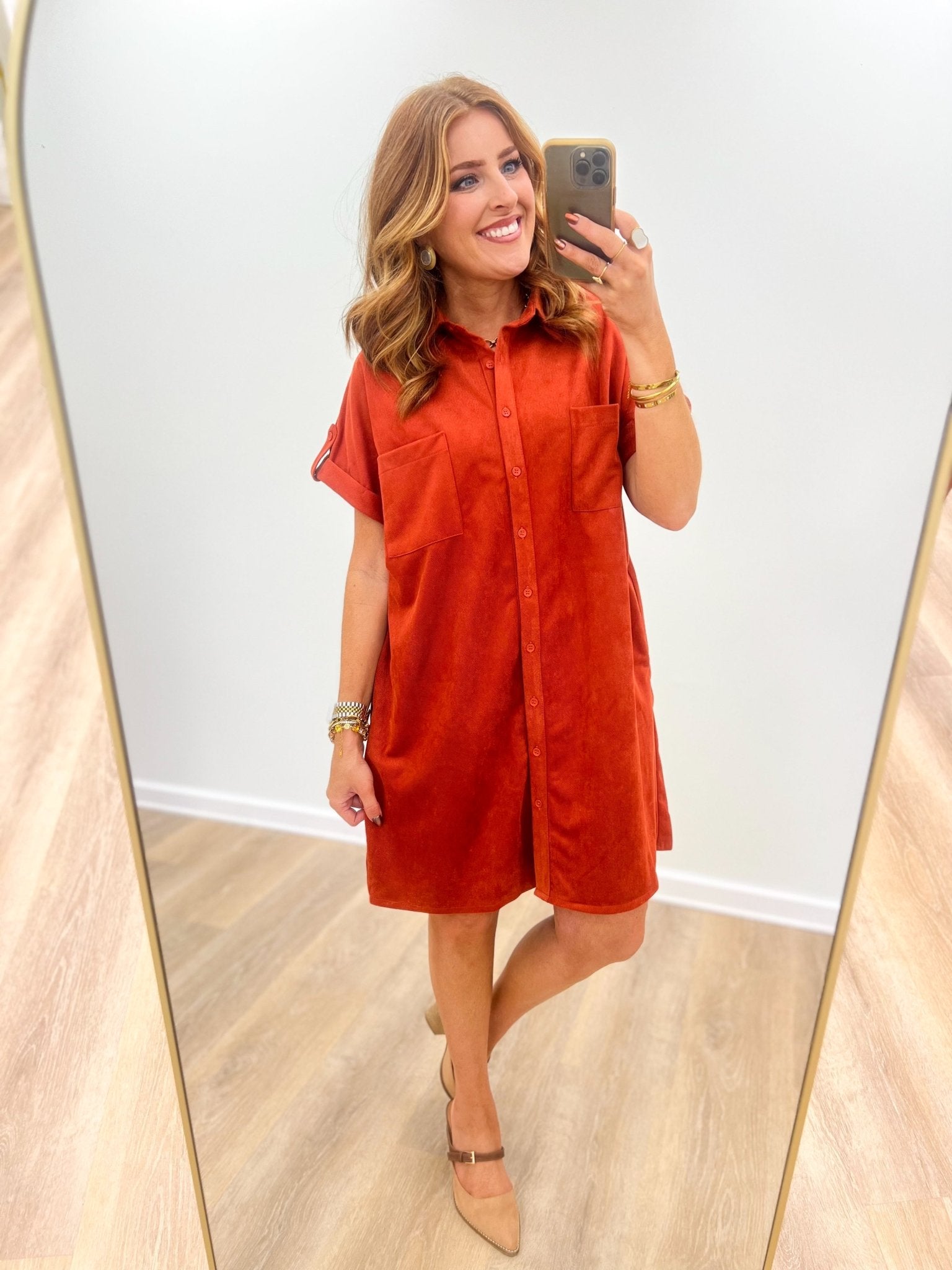 Front pocket detail on a suede button down dress