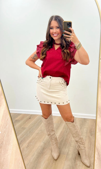 Mini skirt in suede with decorative stud trim