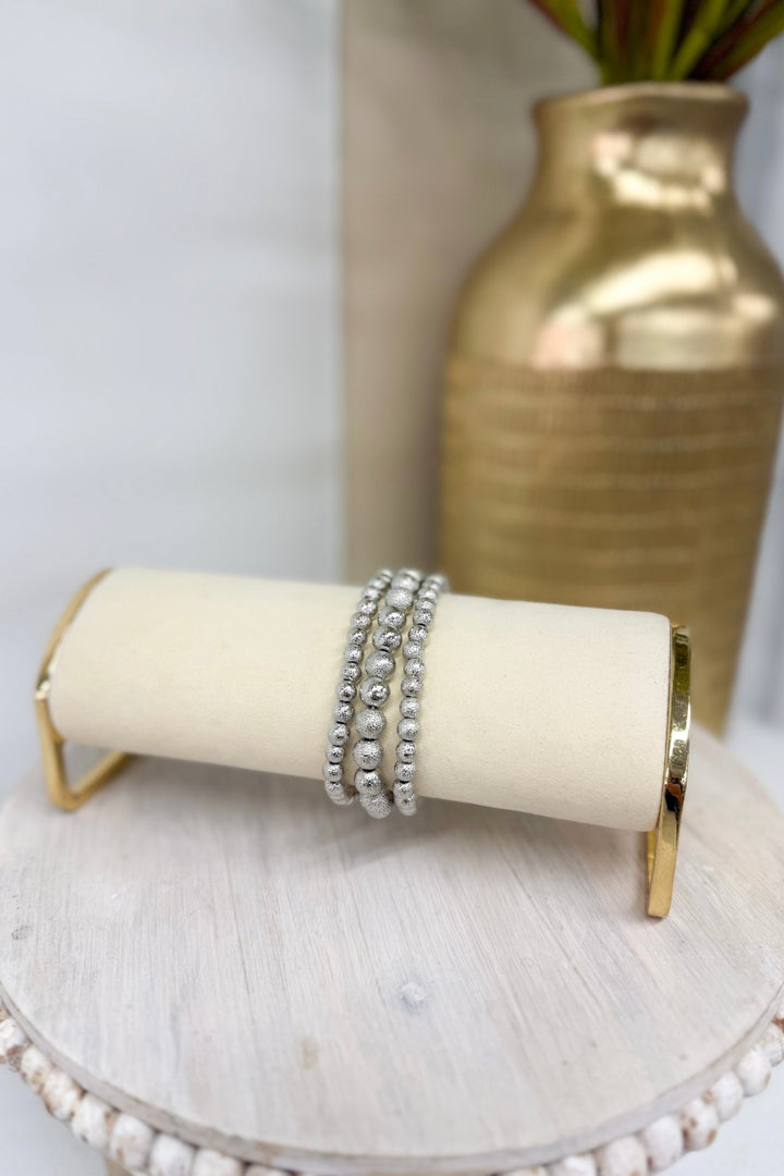Silver three-row textured metal ball bracelet