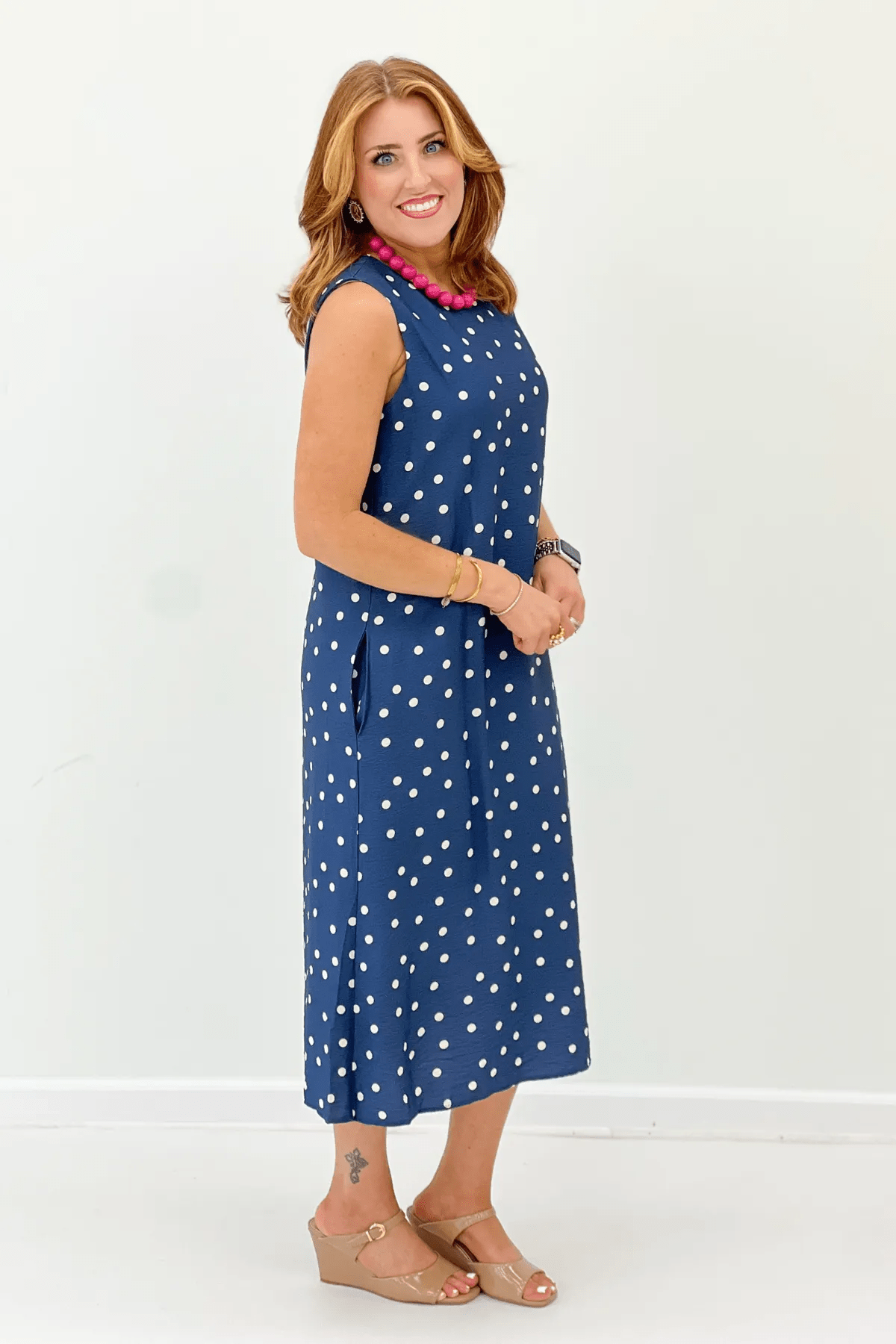 Polka dot midi dress with a rounded neckline