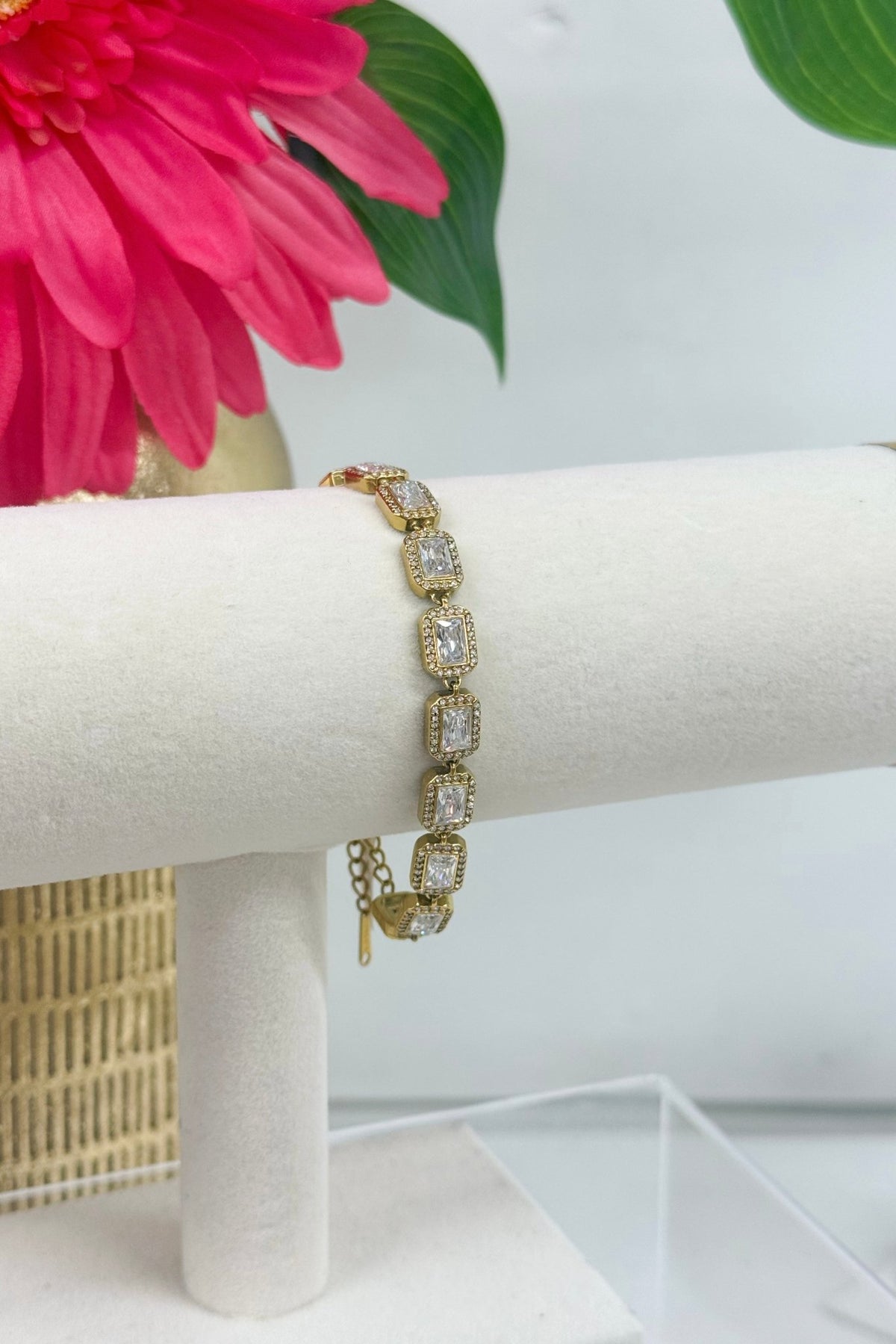 Square cut stone bracelet in a fine setting