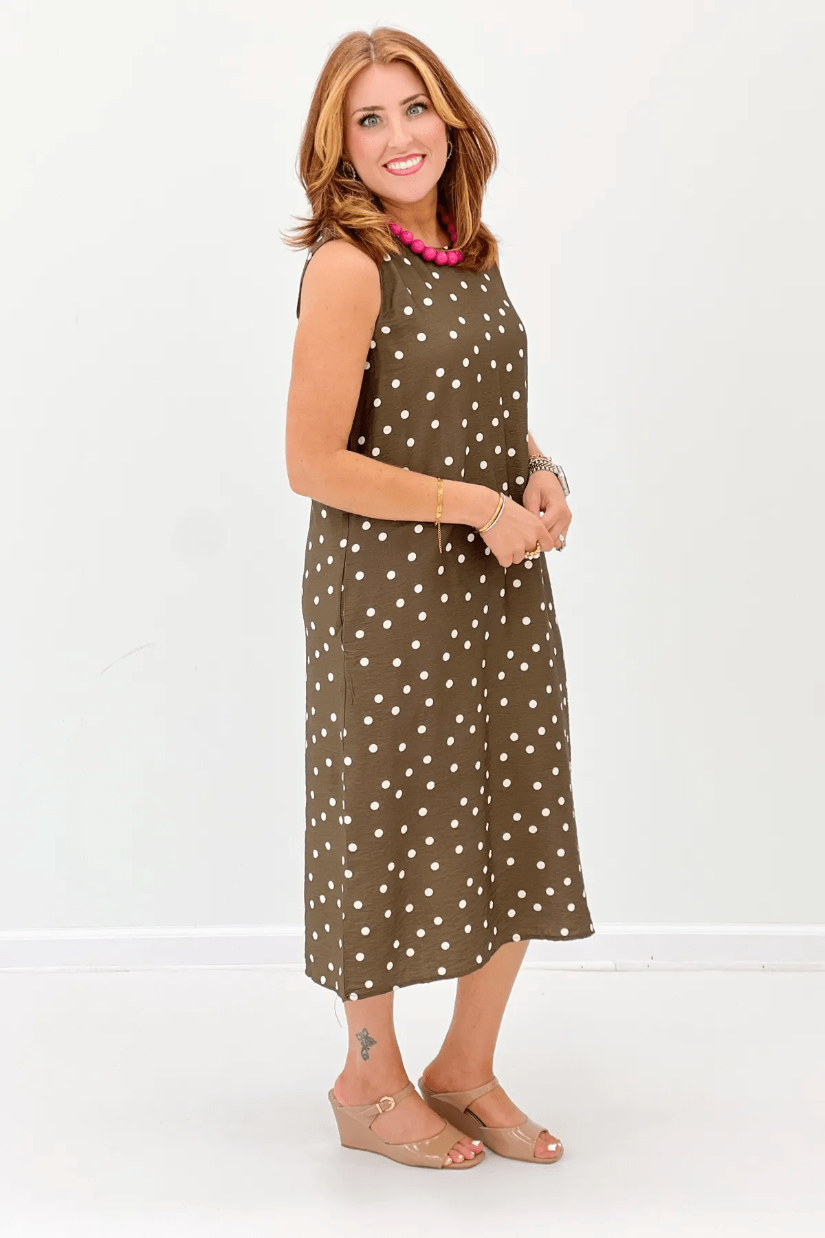 Dotted print detail on a sleeveless midi dress