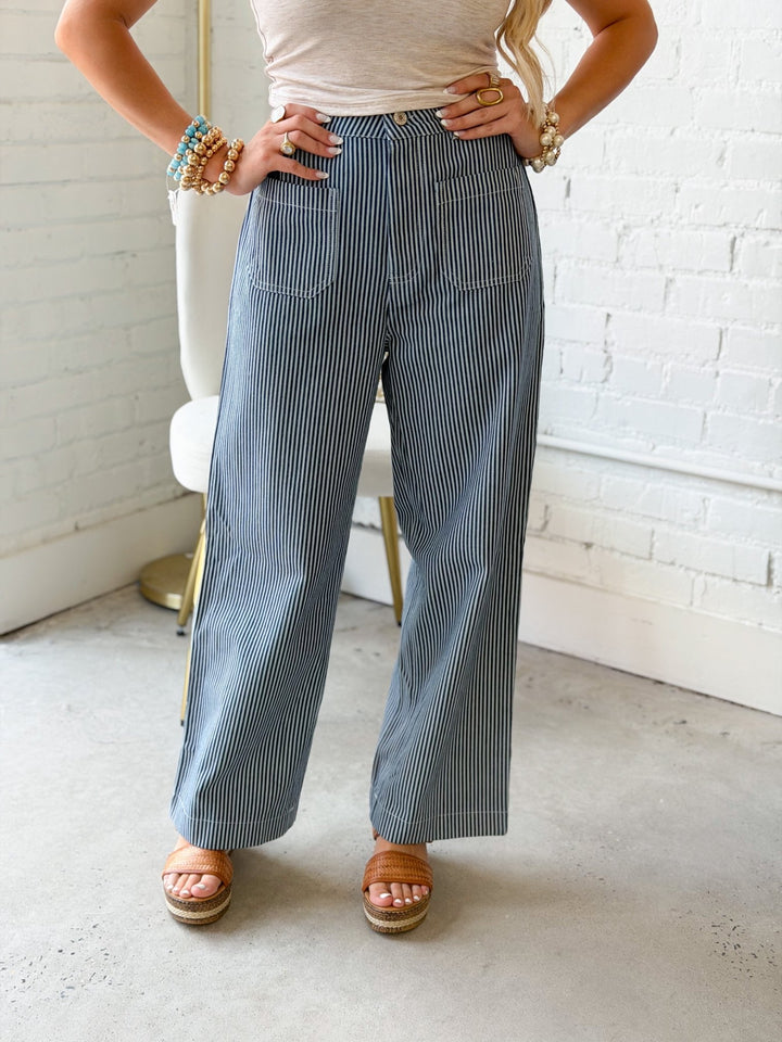 Navy striped pants with front pocket detail