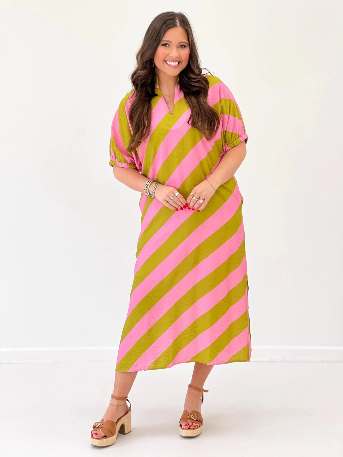 V-neck striped maxi dress with a breezy drape
