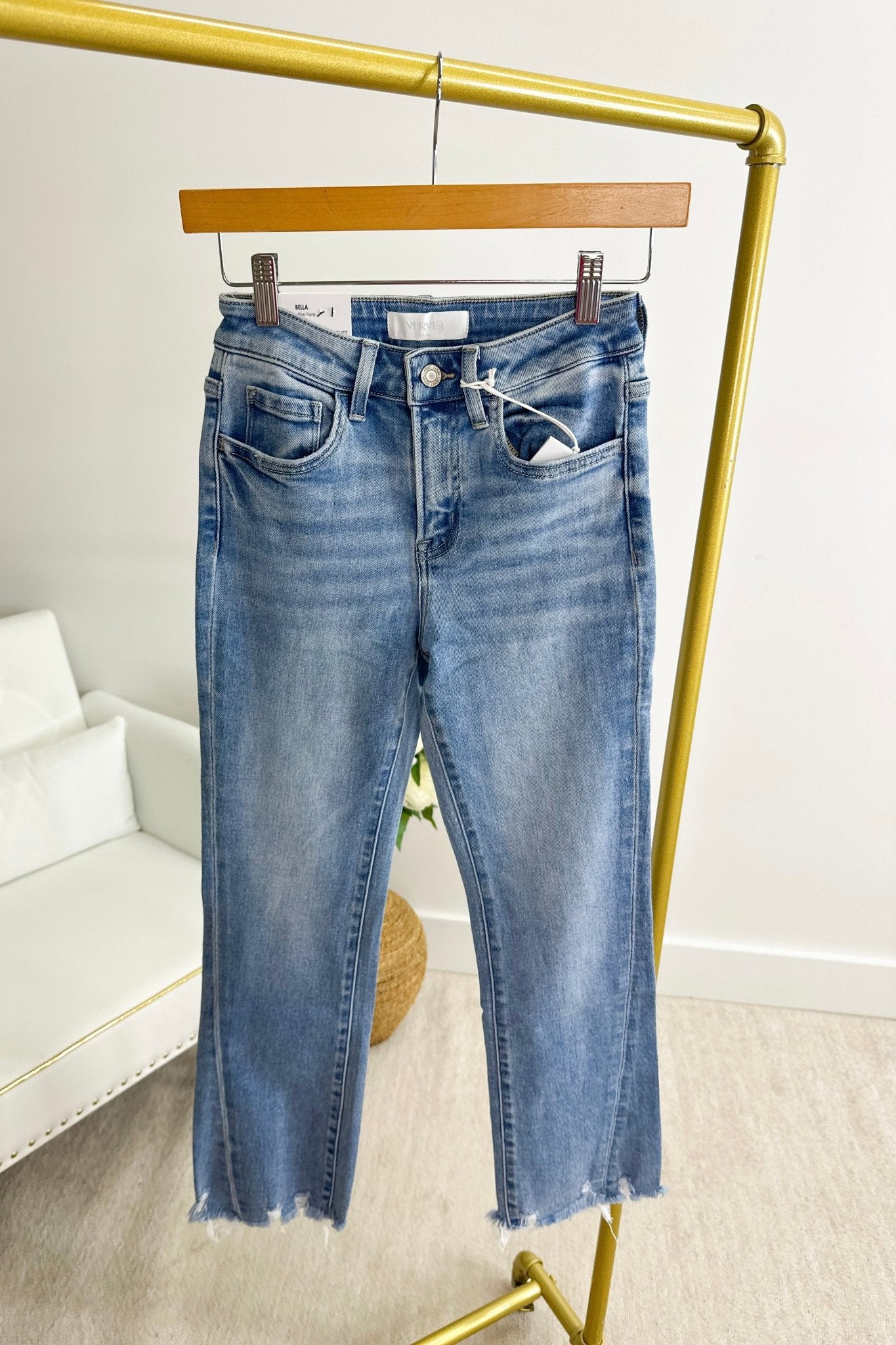 High rise kick flare denim with a raw edge hem