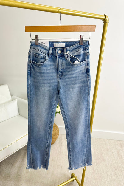 High rise kick flare denim with a raw edge hem