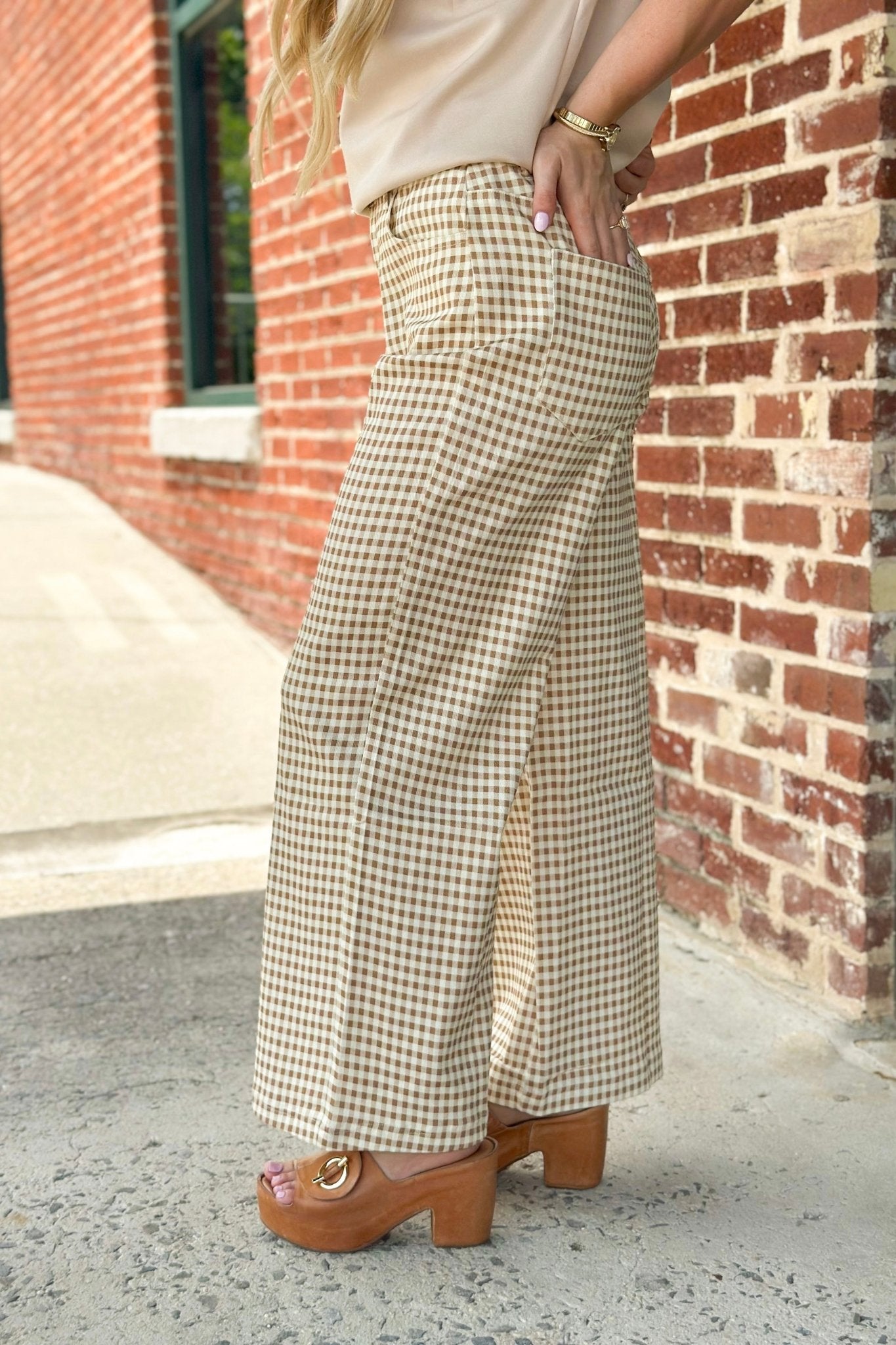 Tan gingham check pants with an elastic waist