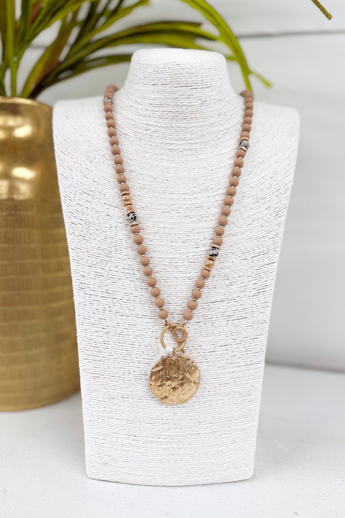 Long tan necklace with hammered disk beads
